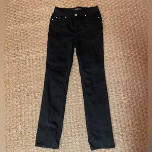 black flare boot jeans with a front slit